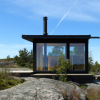 Margen Wigow Arkitektkontor在瑞典渔民小屋上为木材度假屋建模