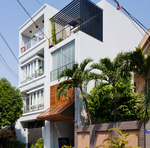  MMArchitects设计的越南店屋具有可折叠的立面 