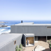 LANDArquitectos设计的智利海滨房屋旨在捕捉美景